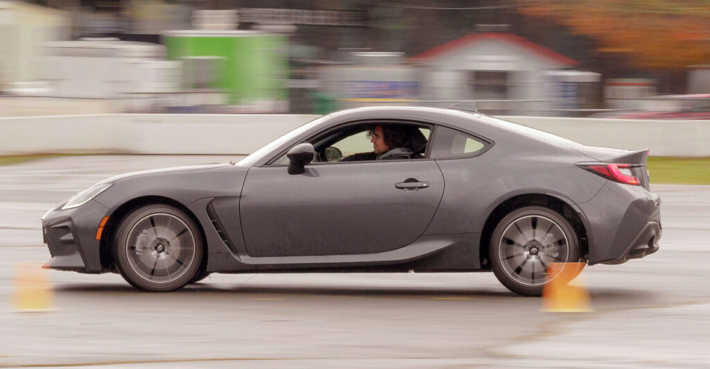 car doing One-day high perfomrmance driving experience, driving through cones
