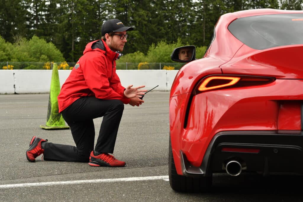 Prpformance coach training a driver
